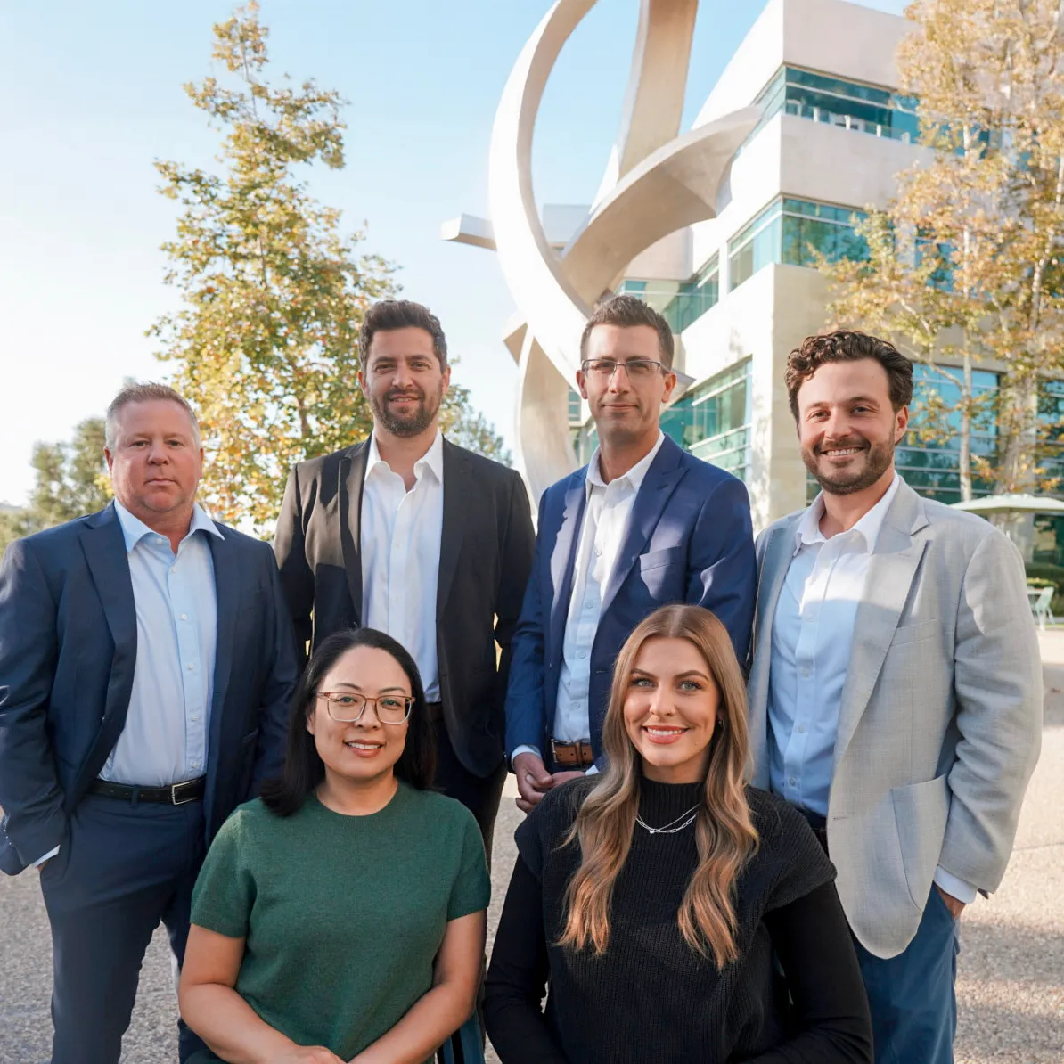 Solas Wealth Strategies team of experienced financial advisors outside their office in San Diego.