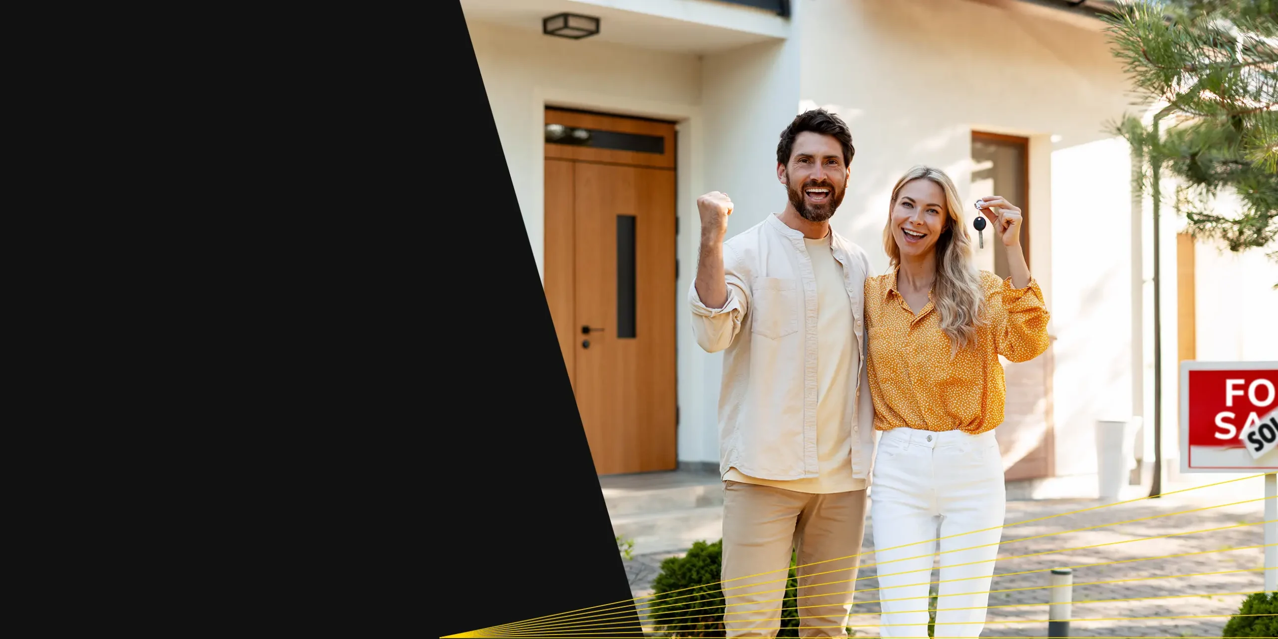 Young caucasian couple standing outside their new home holding keys.